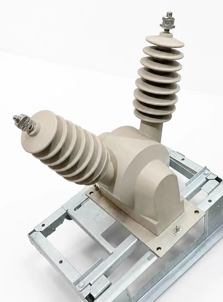 VTOP series 33kV outdoor voltage transformer, a grey cast resin unit with two ribbed bushings on a galvanised mounting frame